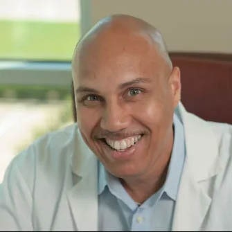 Portrait photo of doctor Brent Johnson, an endodontist in Uptown Dallas